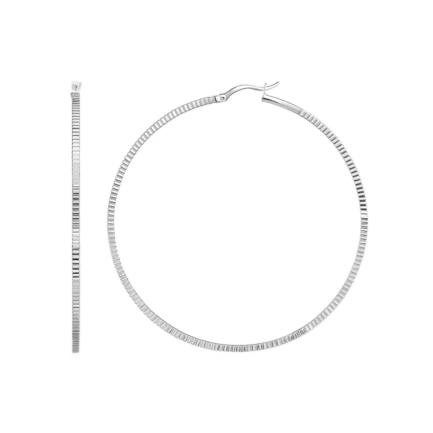 Ridge textured hoop earrings in sterling silver with hinged snap backs.