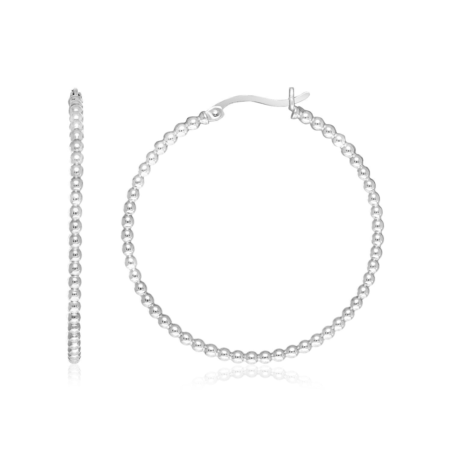 Sterling silver round hoop earrings with a beaded texture and hinged clasps.