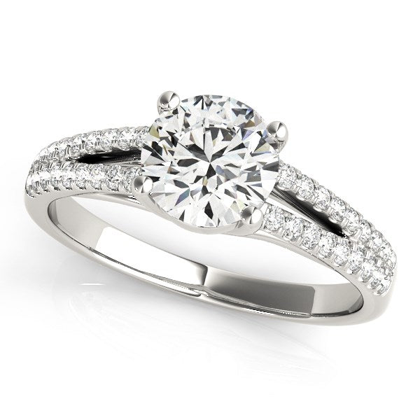 14k white gold split shank engagement ring with a round center diamond and pave accents.