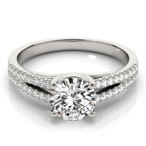 14k white gold split shank engagement ring with a round diamond center stone.