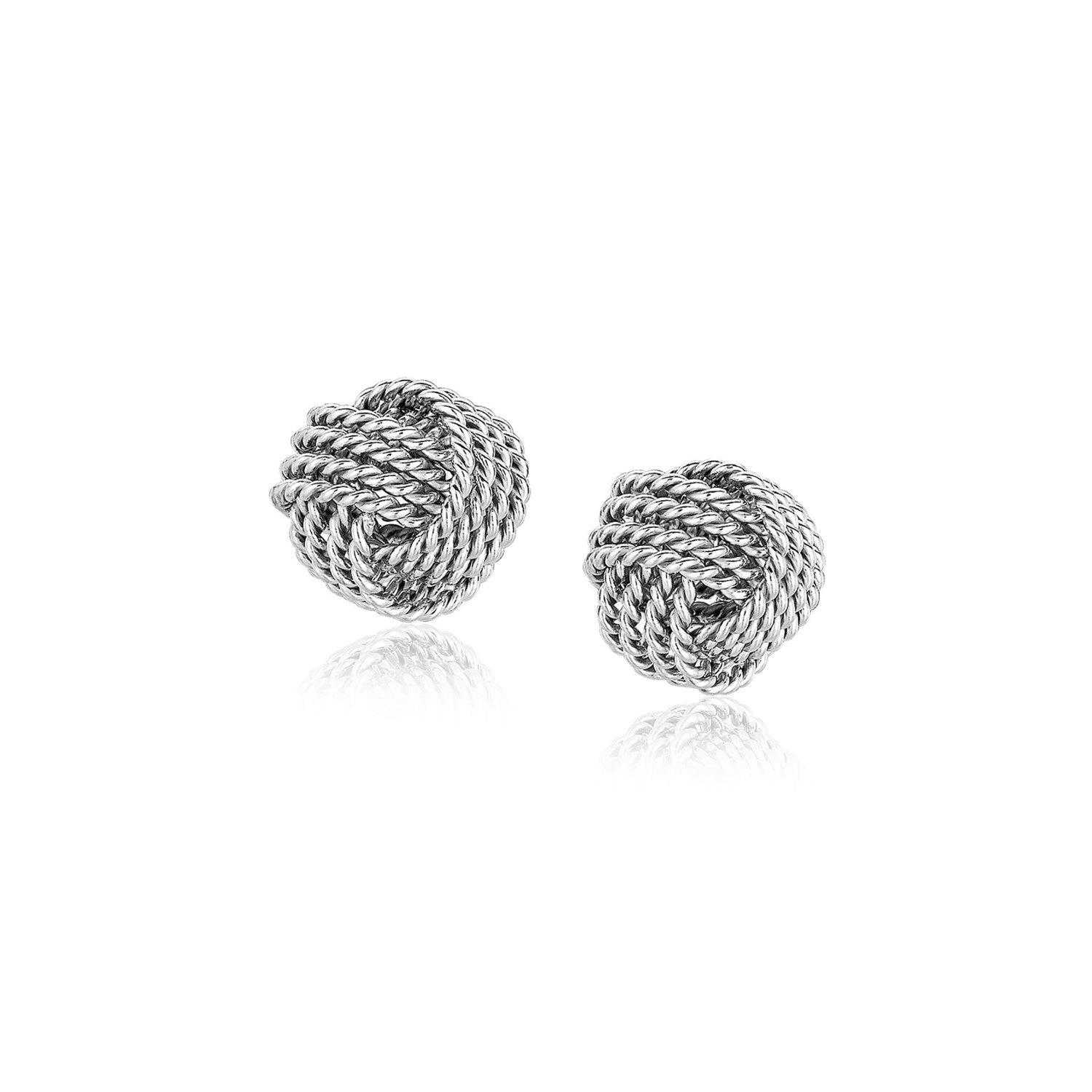 Sterling silver textured love knot stud earrings with a reflective surface.