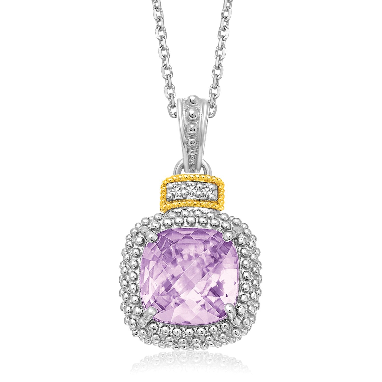 Sterling silver and yellow gold pendant with a cushion amethyst and diamond accents.