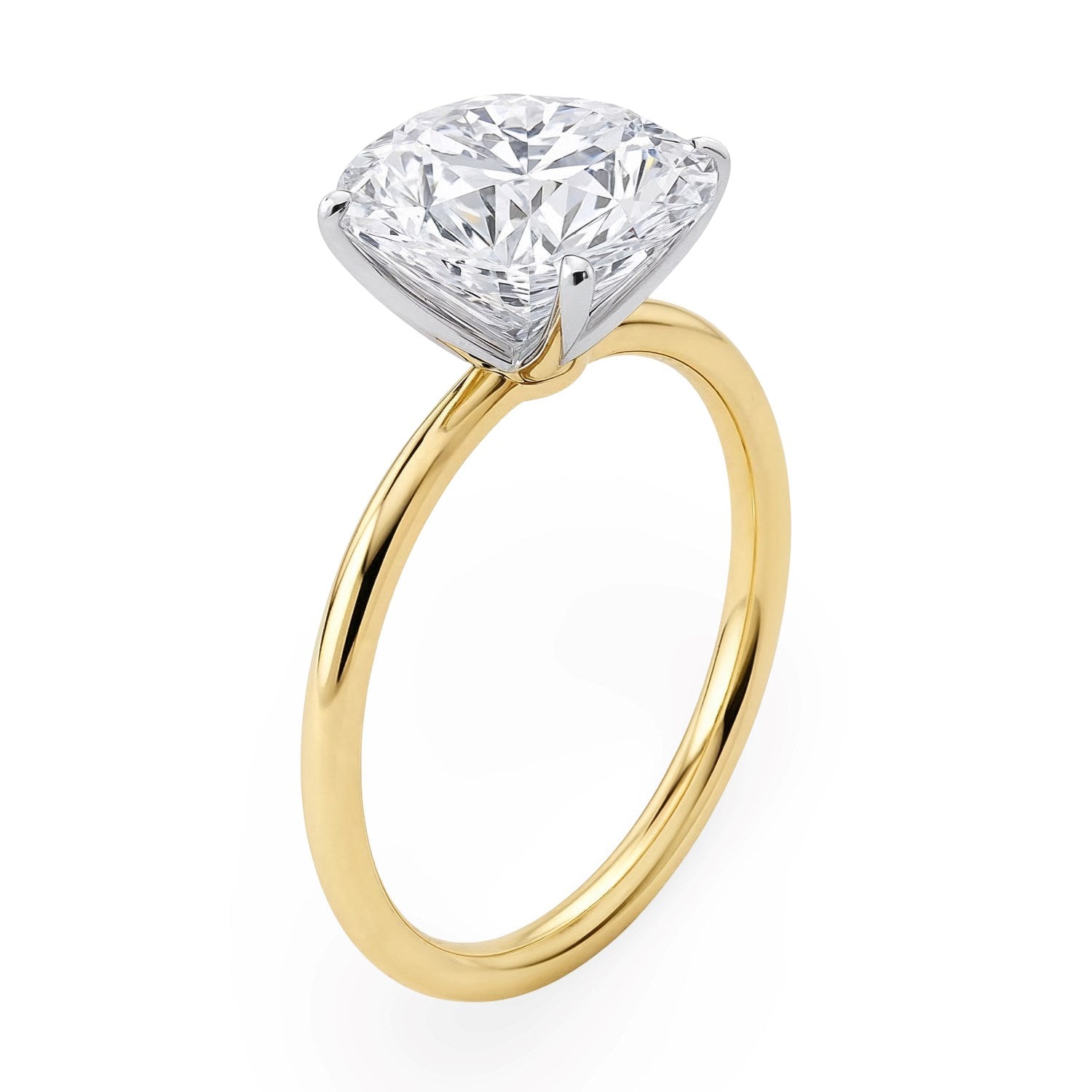 A 3 carat round lab grown diamond solitaire ring in 10K yellow gold.
