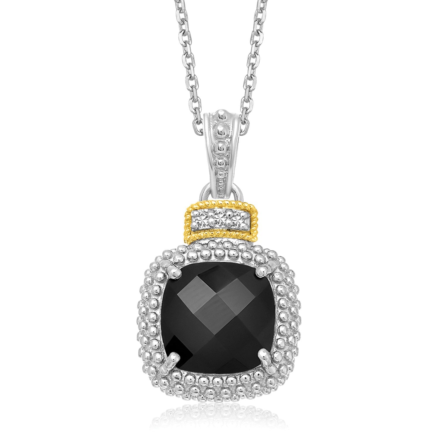 Sterling silver and 18k yellow gold pendant with a cushion-cut black onyx and diamond accents.
