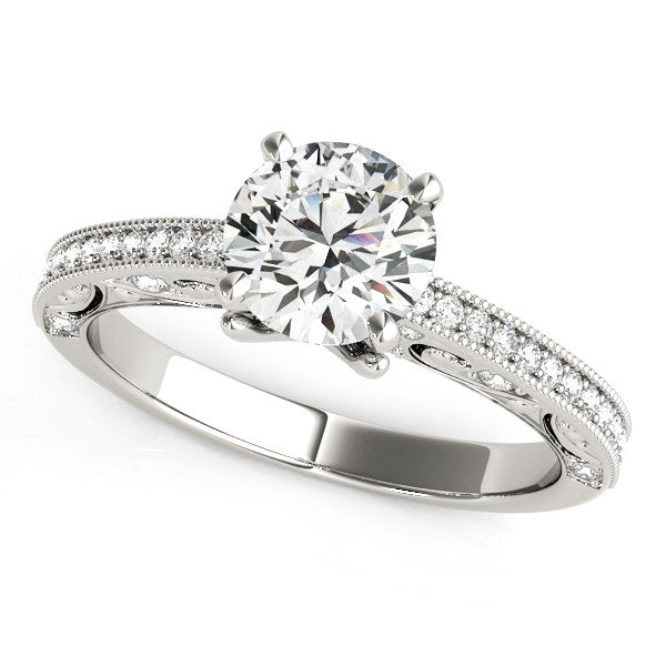 14k white gold antique pronged round diamond engagement ring with pave set shank.