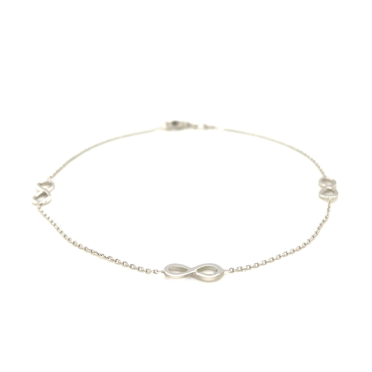 Sterling silver anklet with three infinity symbols and a spring ring clasp.