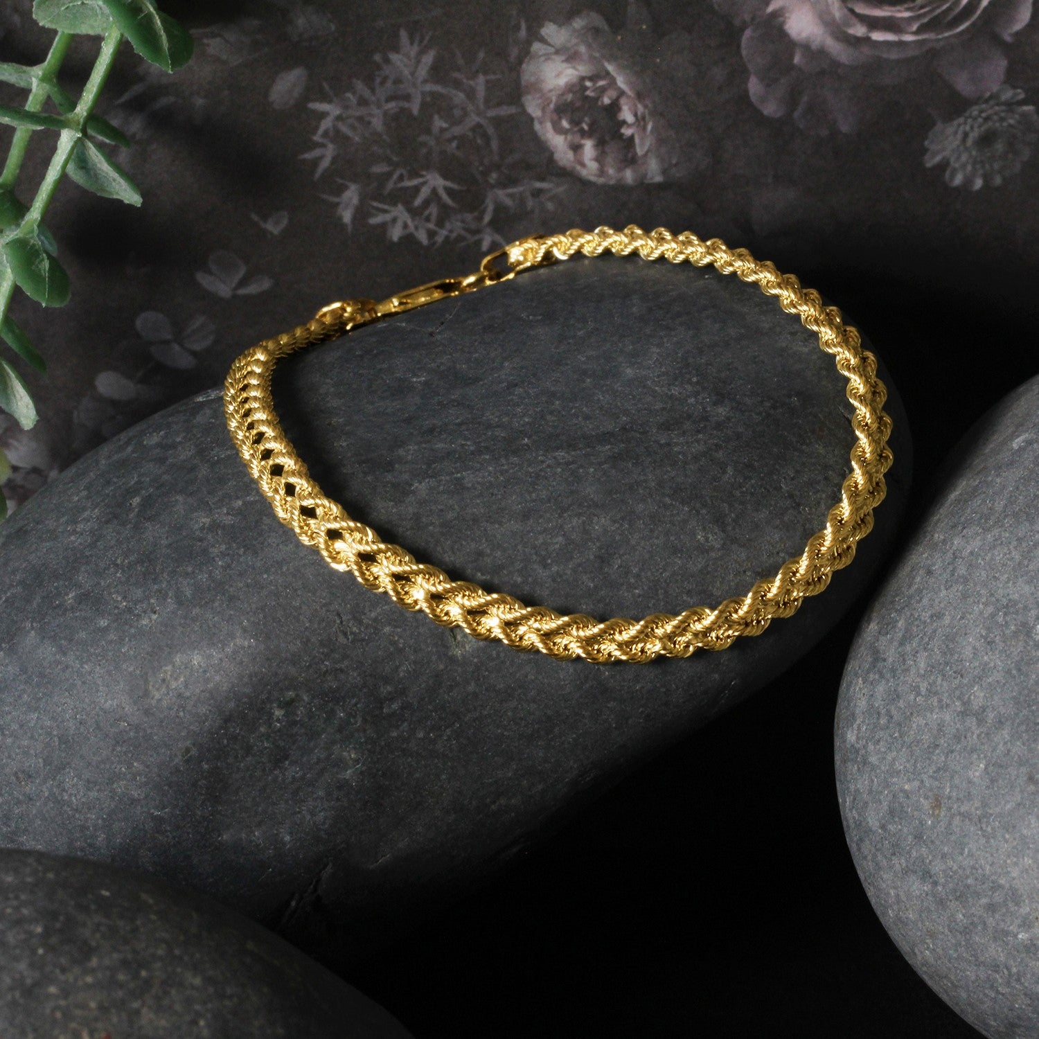 A double rope chain bracelet in 10k yellow gold with a lobster clasp.