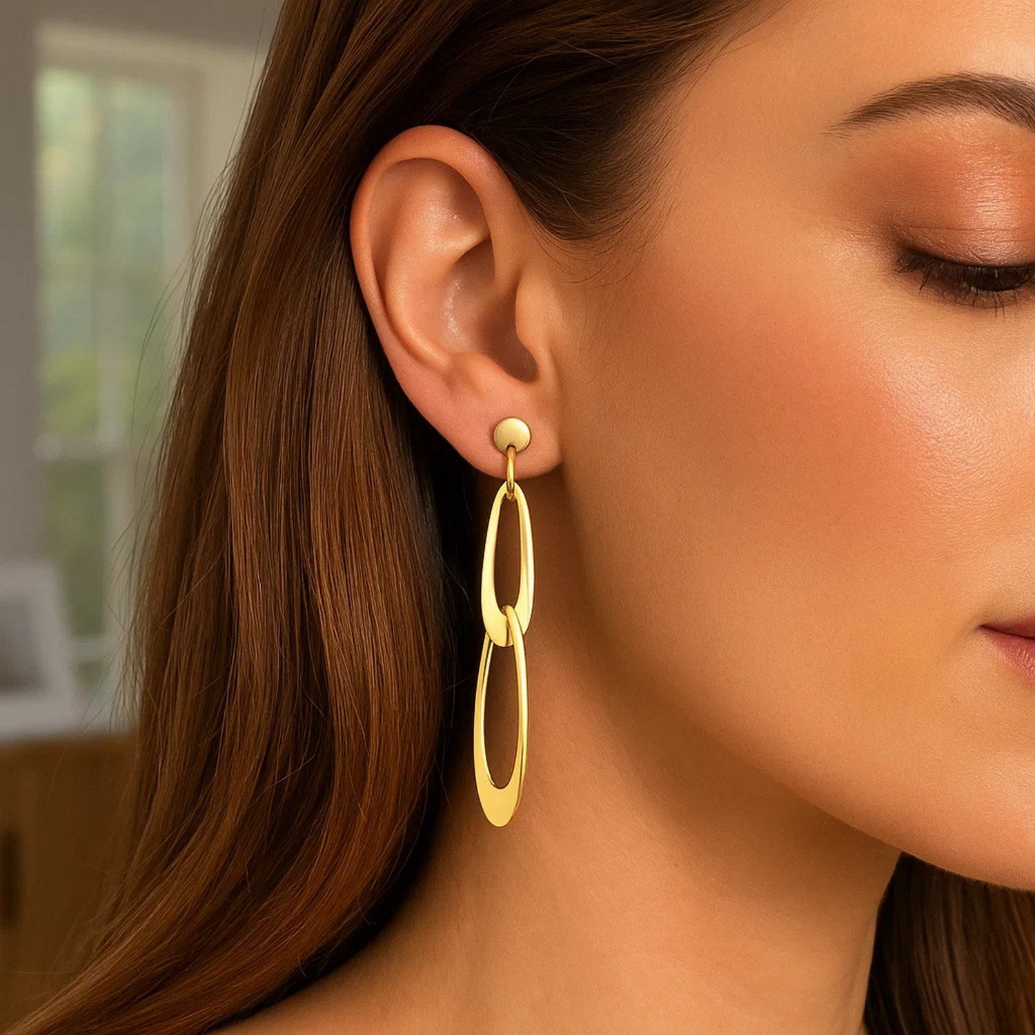 14k yellow gold Italian oval link earrings with a high polish finish.