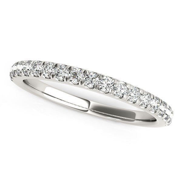 A 14k white gold wedding ring with pave-set round diamonds.