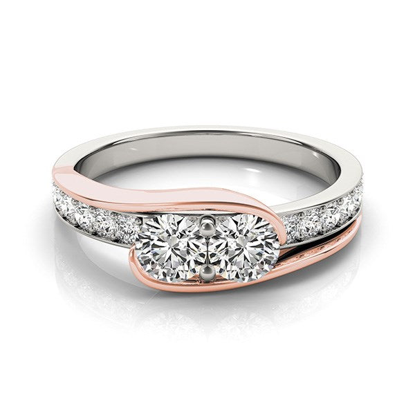 Two-stone diamond ring in 14k white and rose gold with pave side diamonds.