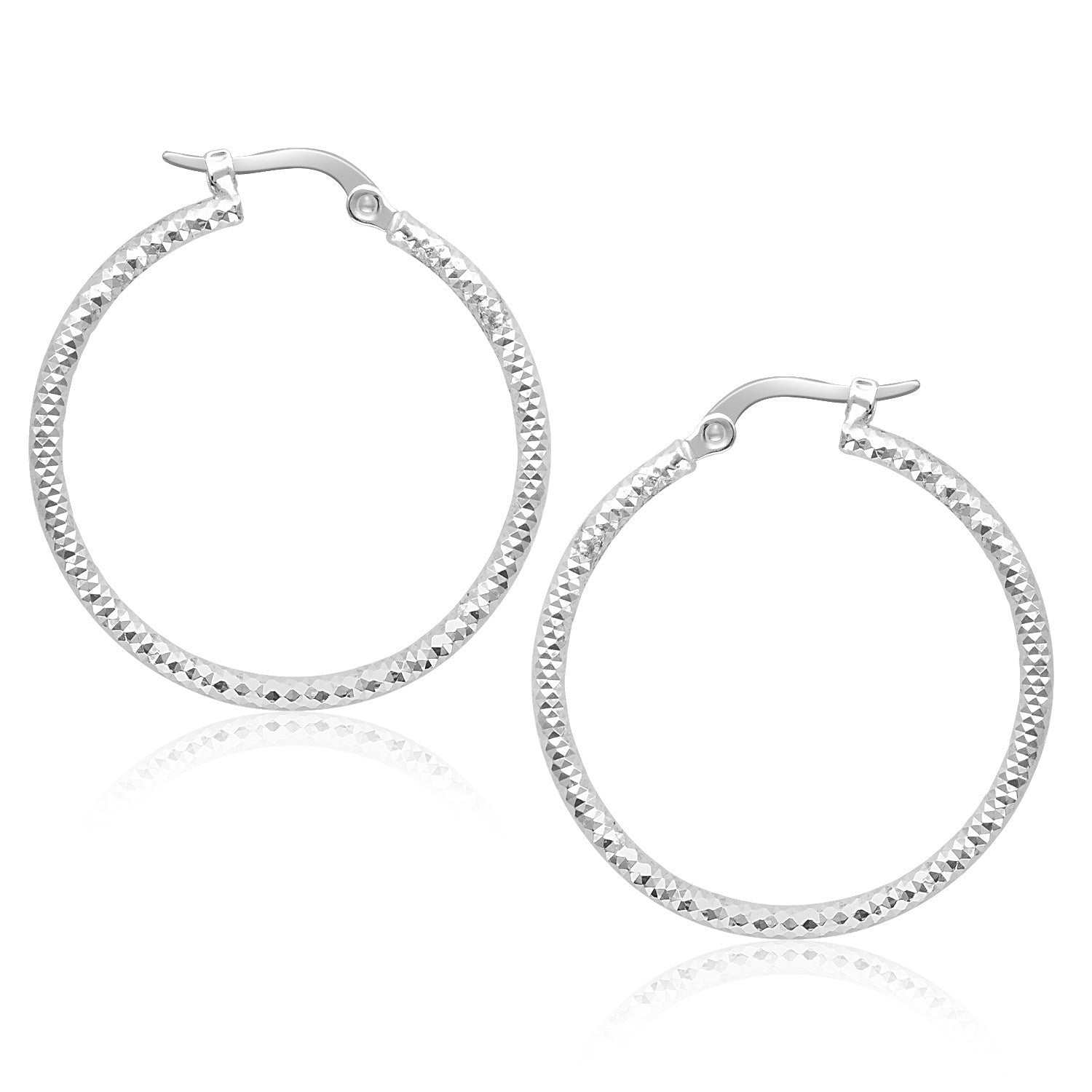 Pair of 14k white gold textured round hoop earrings with snapbacks.