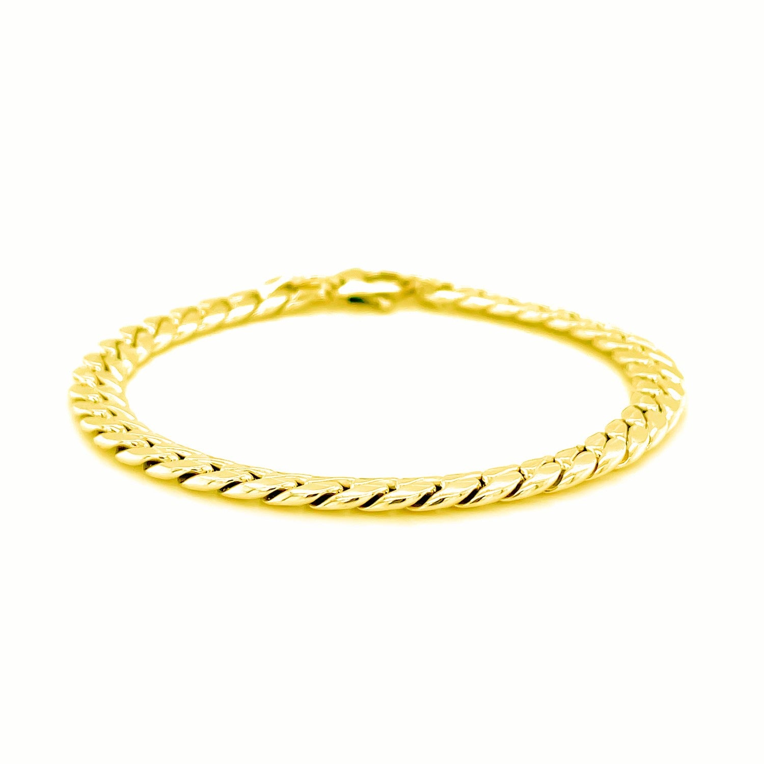14K yellow gold Cuban link bracelet with a lobster clasp.