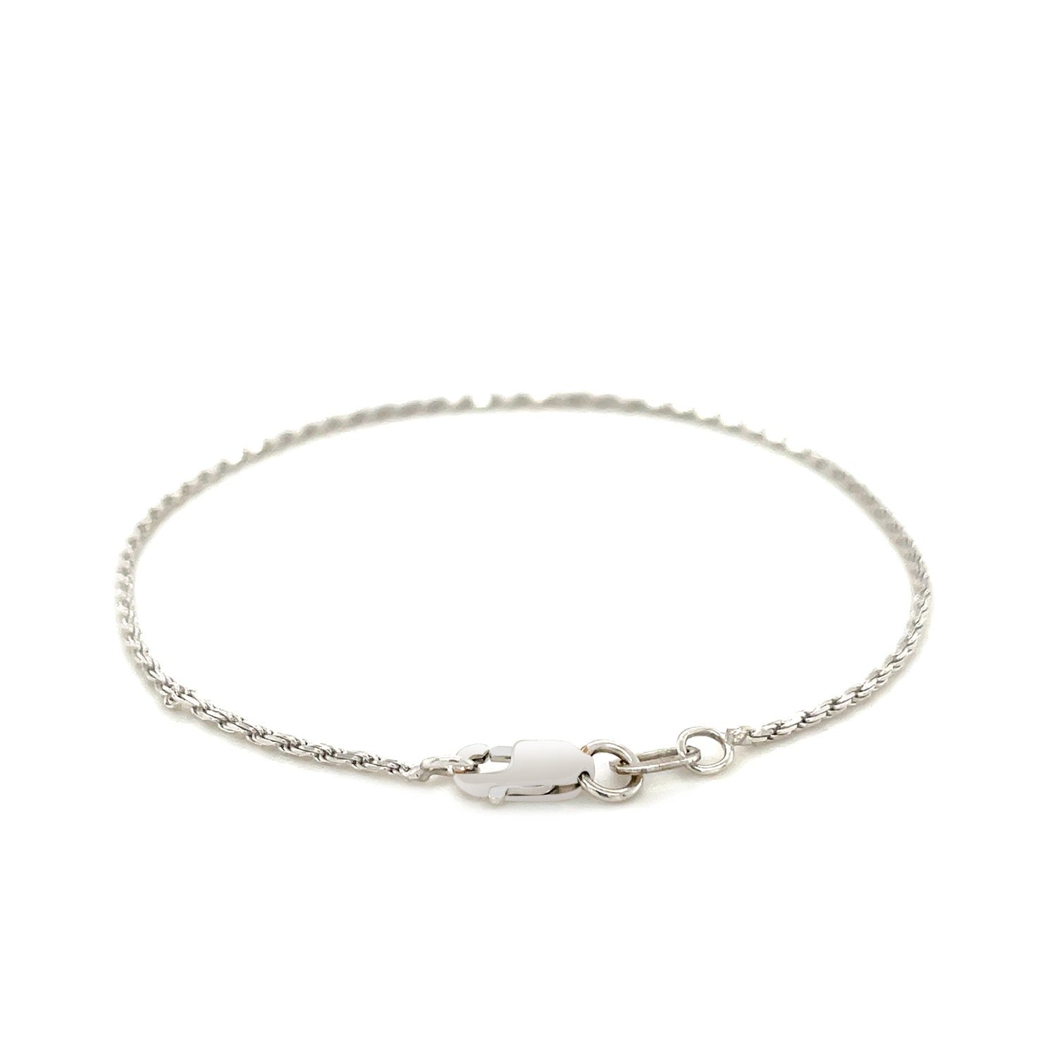 A 14k white gold diamond cut rope anklet with a lobster clasp.