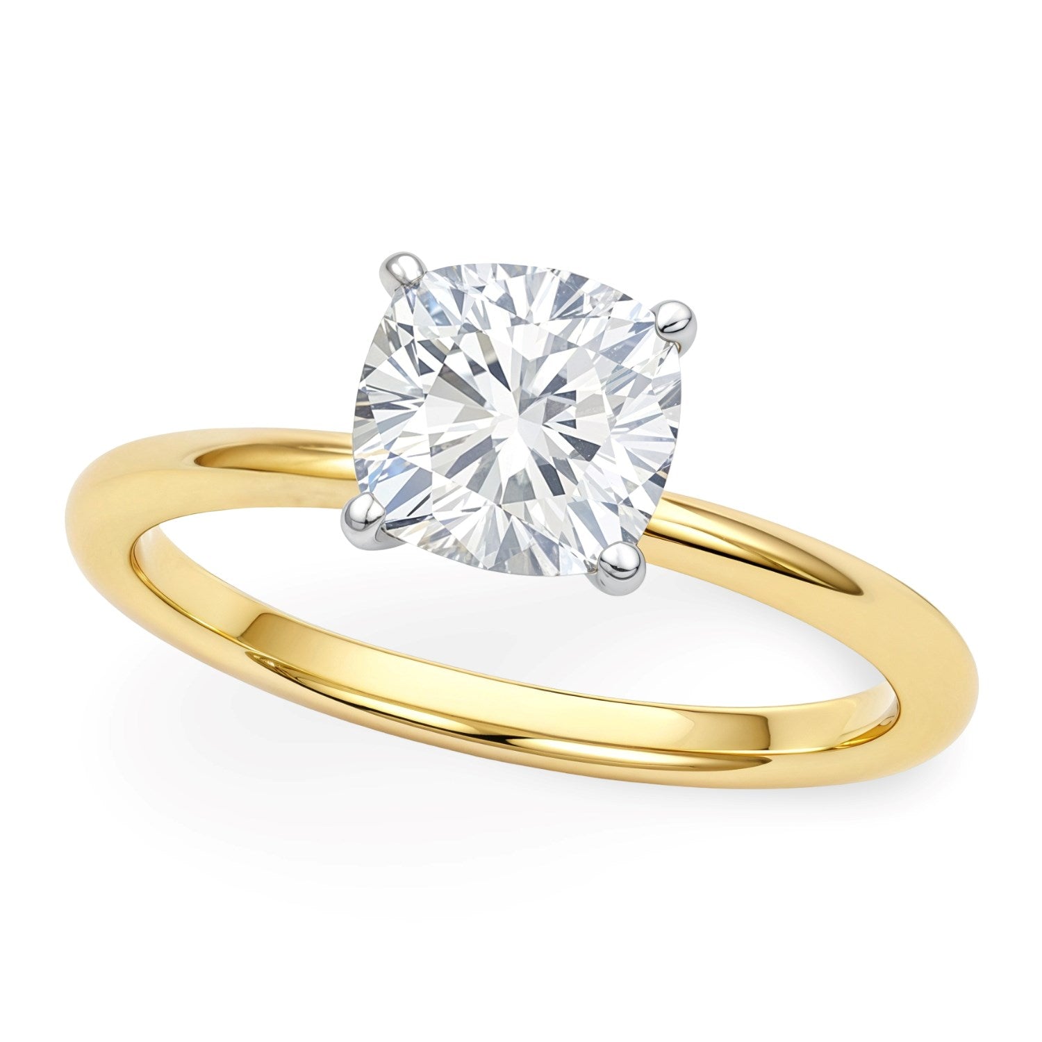 A cushion-cut lab-grown diamond ring with a yellow gold band and white gold prongs.