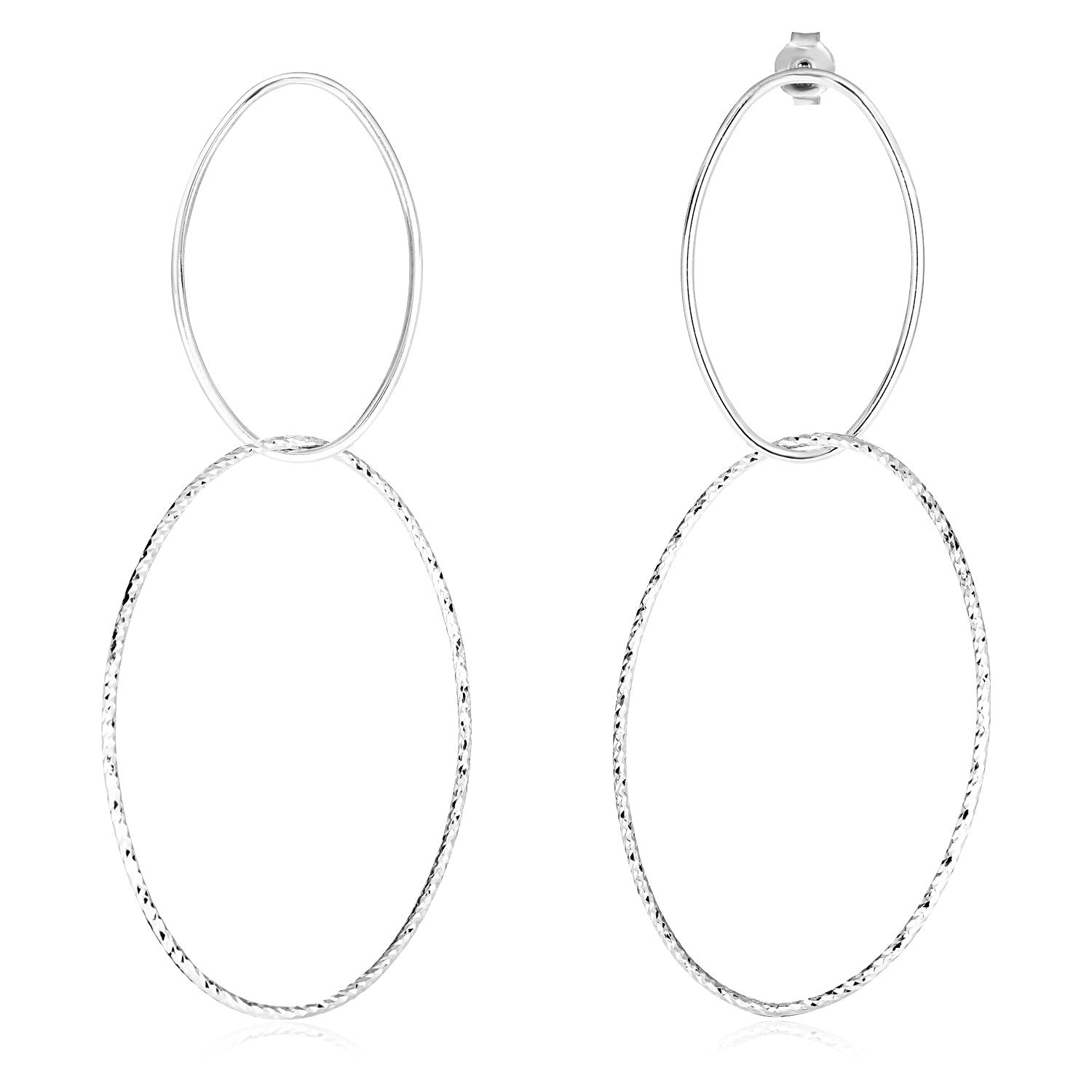 Sterling silver interlocking oval dangle earrings with one polished and one textured oval.