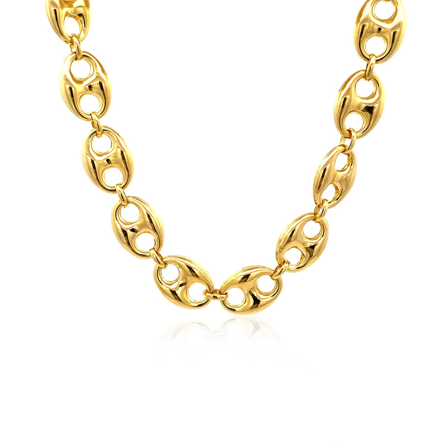 A shiny 14k yellow gold puffed mariner link chain.