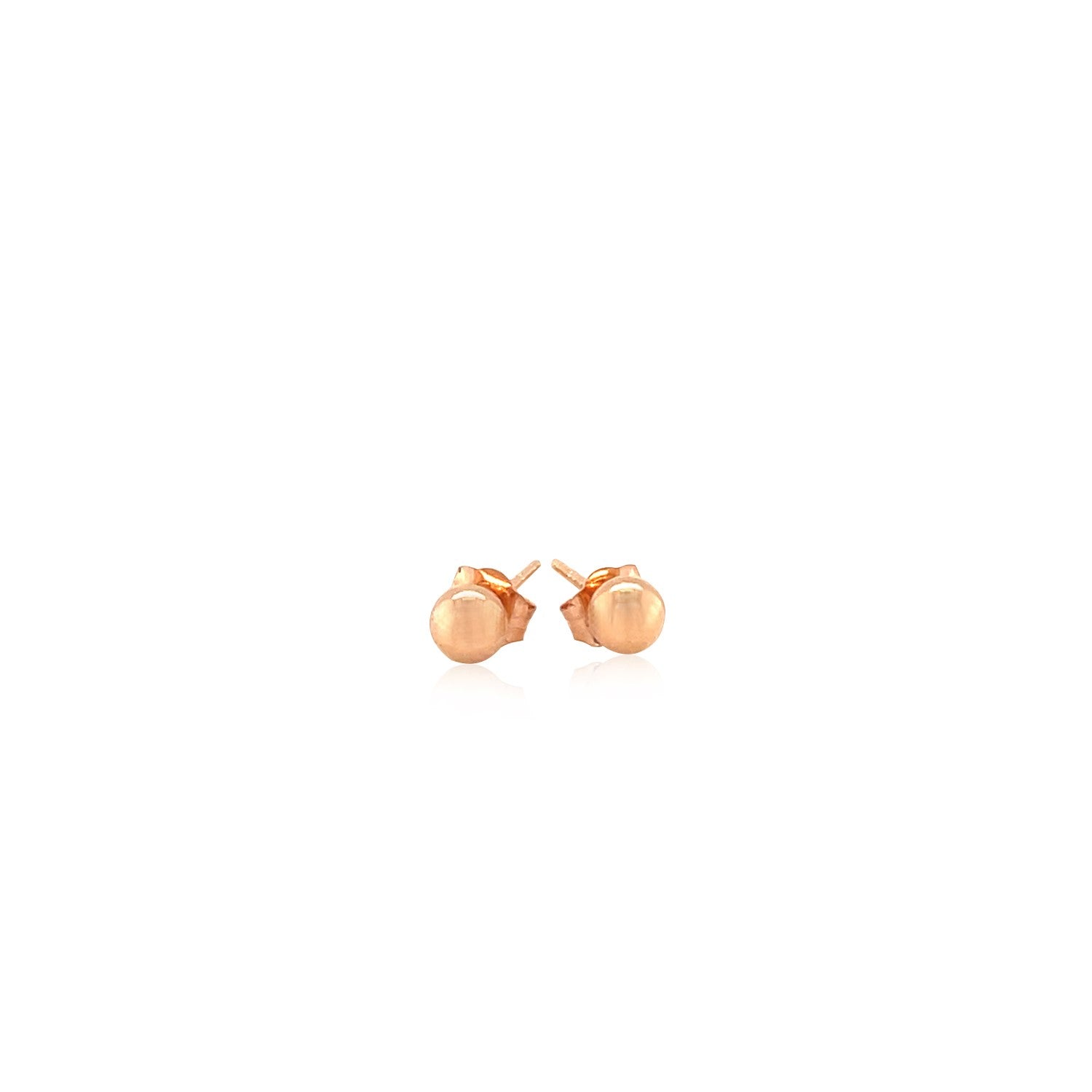 14k rose gold ball style stud earrings with a push back closure.