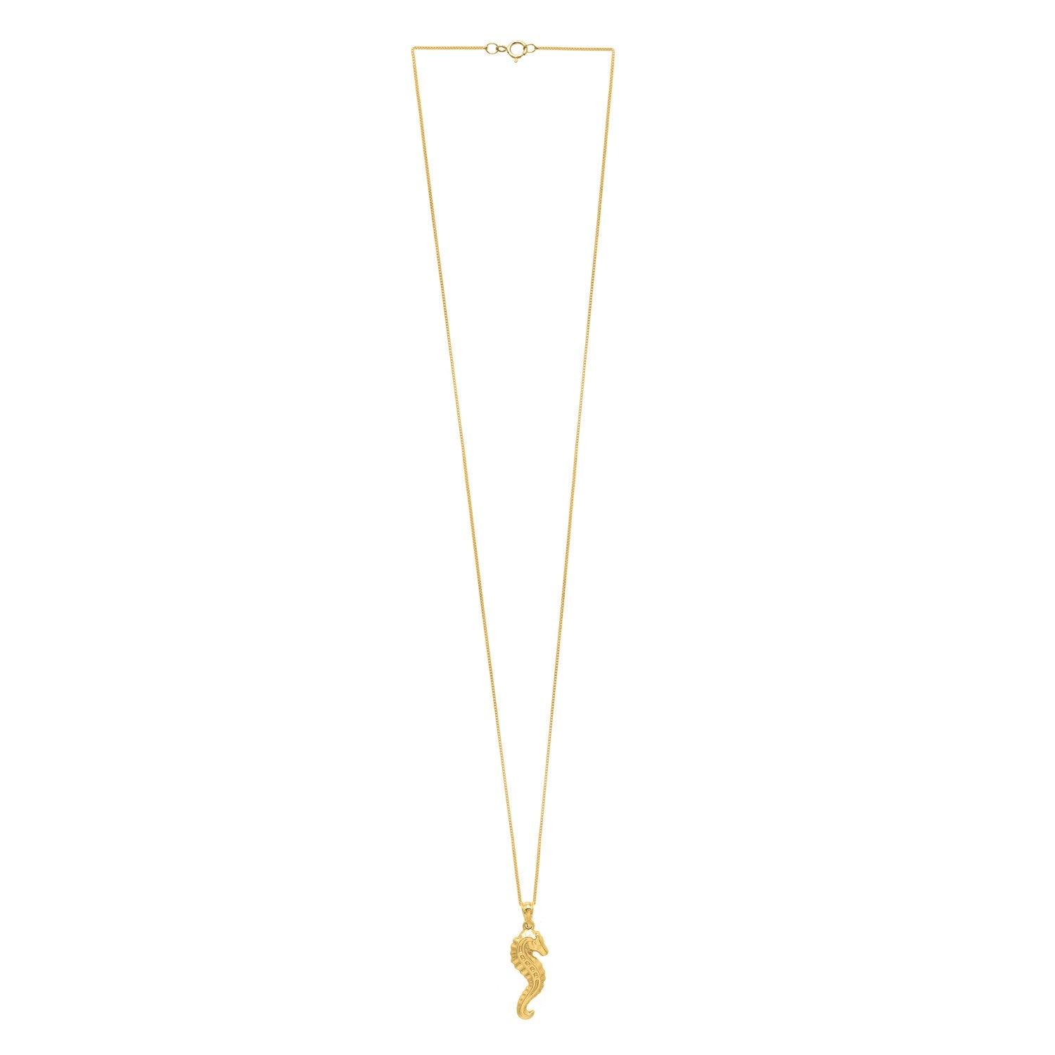 A polished 10K yellow gold seahorse pendant hangs from a delicate chain.