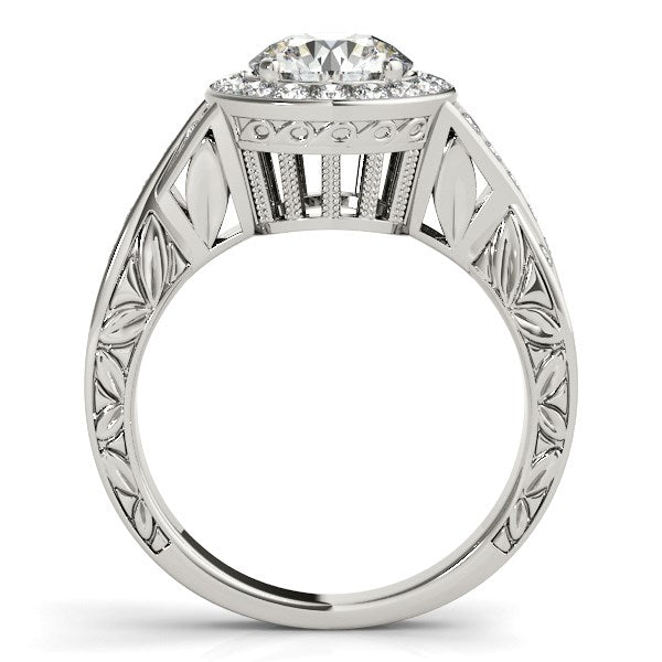 Halo set diamond engagement ring in 14k white gold with intricate band details.