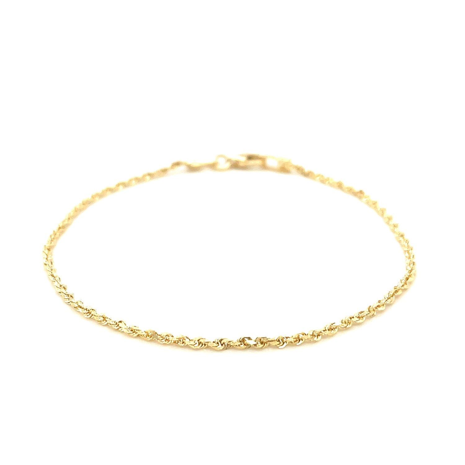 A 10k yellow gold solid diamond cut rope bracelet with a lobster clasp.
