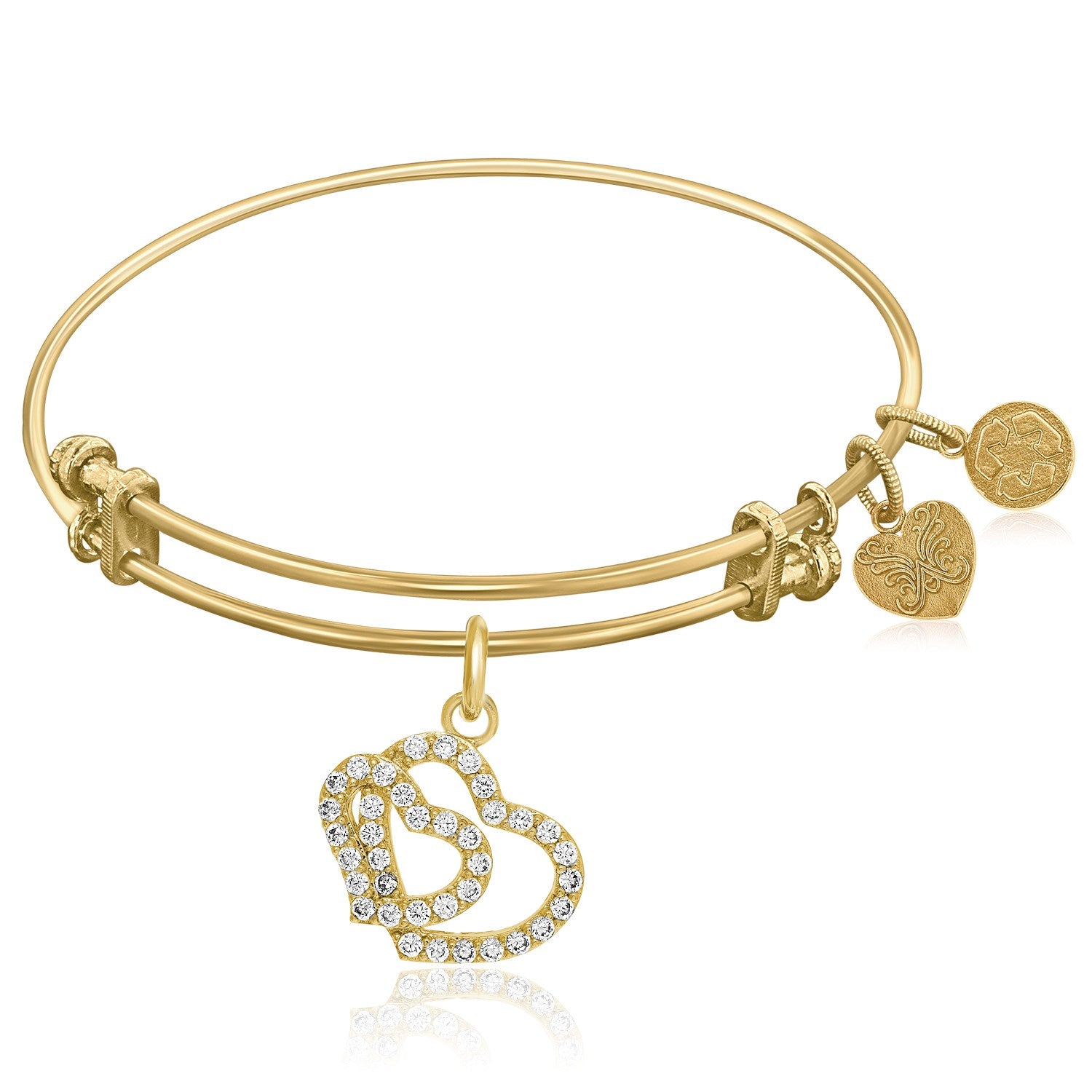 Expandable yellow tone brass bangle with a large crystal-studded double heart charm and two smaller charms.