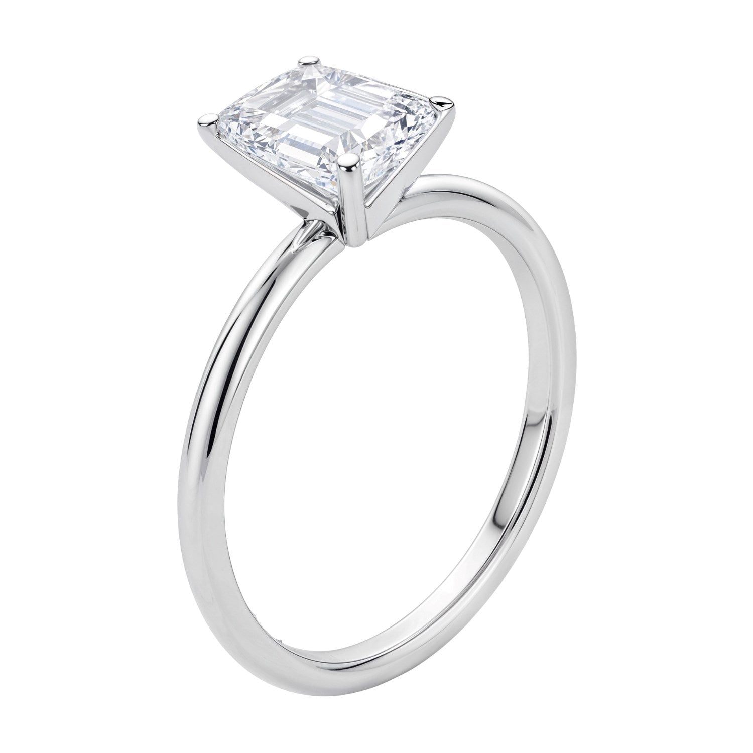 A white gold solitaire ring with an emerald-cut lab-grown diamond.