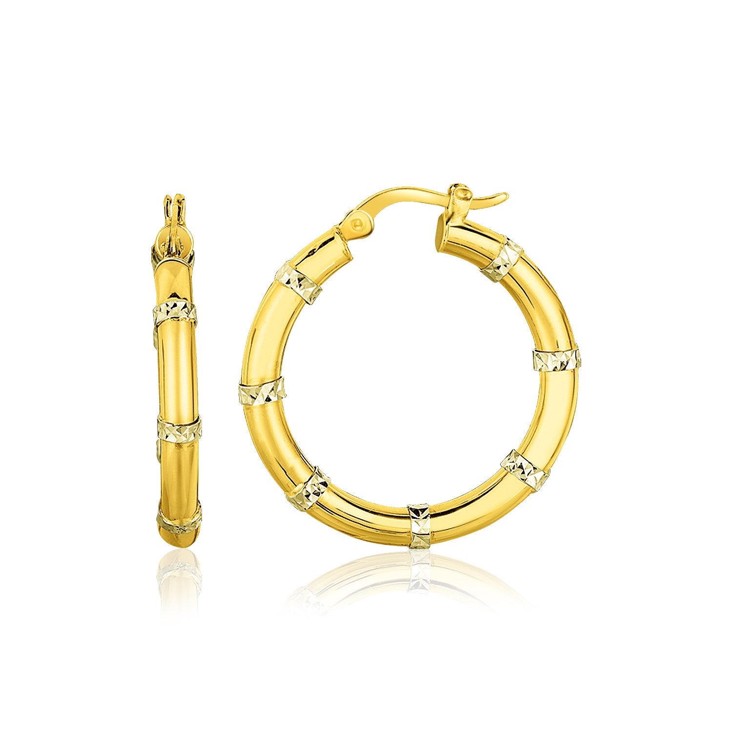14k two-tone gold alternate textured hoop earrings with diamond-cut sections.