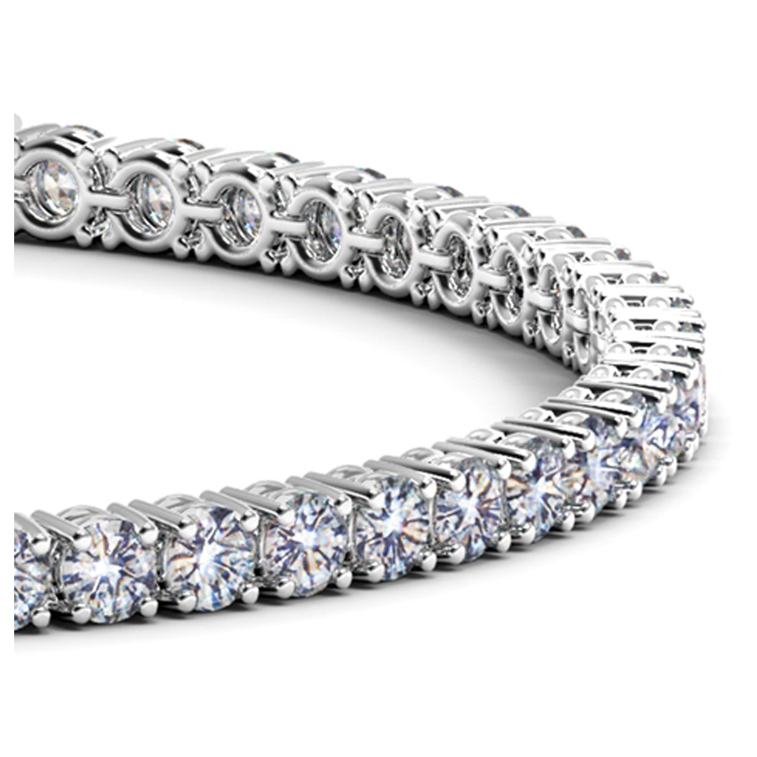 A white gold tennis bracelet with round lab-grown diamonds in a four-prong setting.