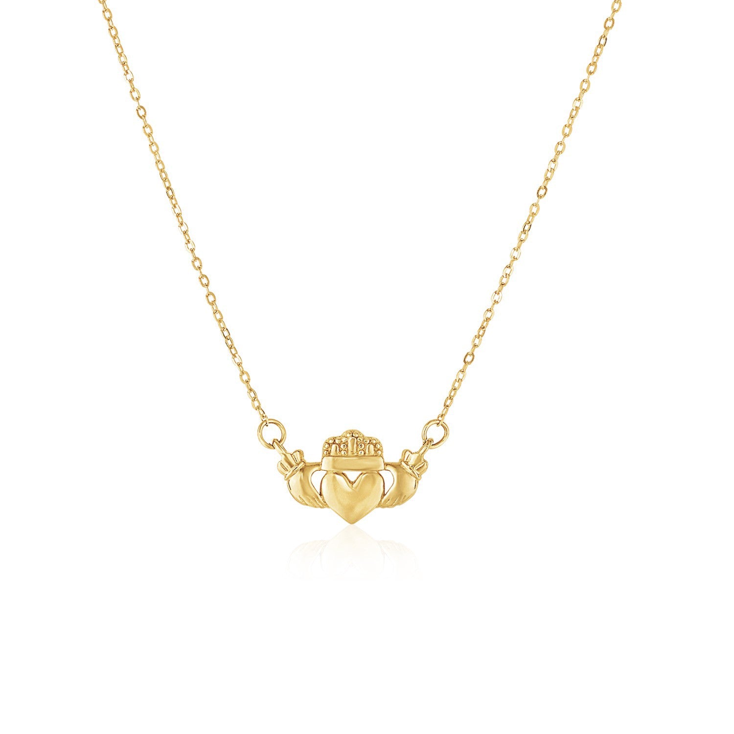 14k yellow gold Claddagh pendant on a cable chain with a subtle reflection.