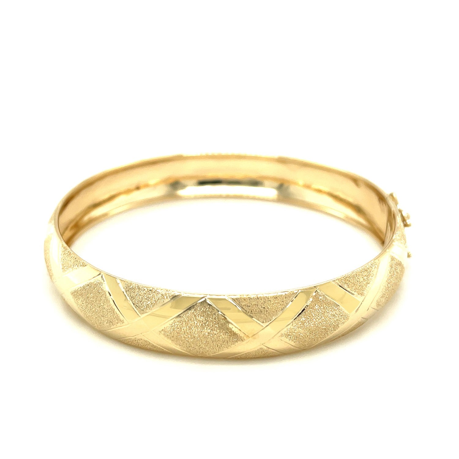10k yellow gold bangle with a dual-textured diamond pattern.
