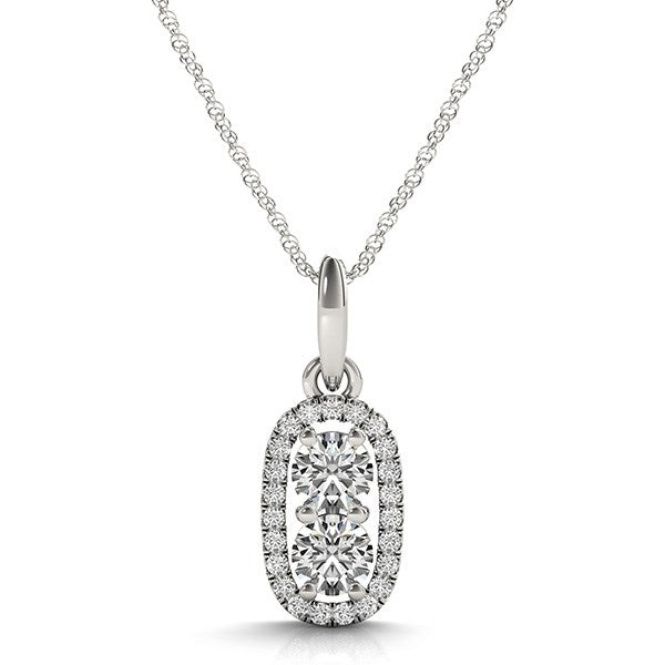 A white gold oval pendant with two large diamonds surrounded by smaller diamonds on a chain.