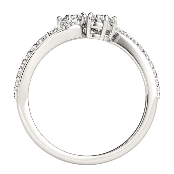 A curved band two-stone diamond ring in 14k white gold with pavé diamonds.