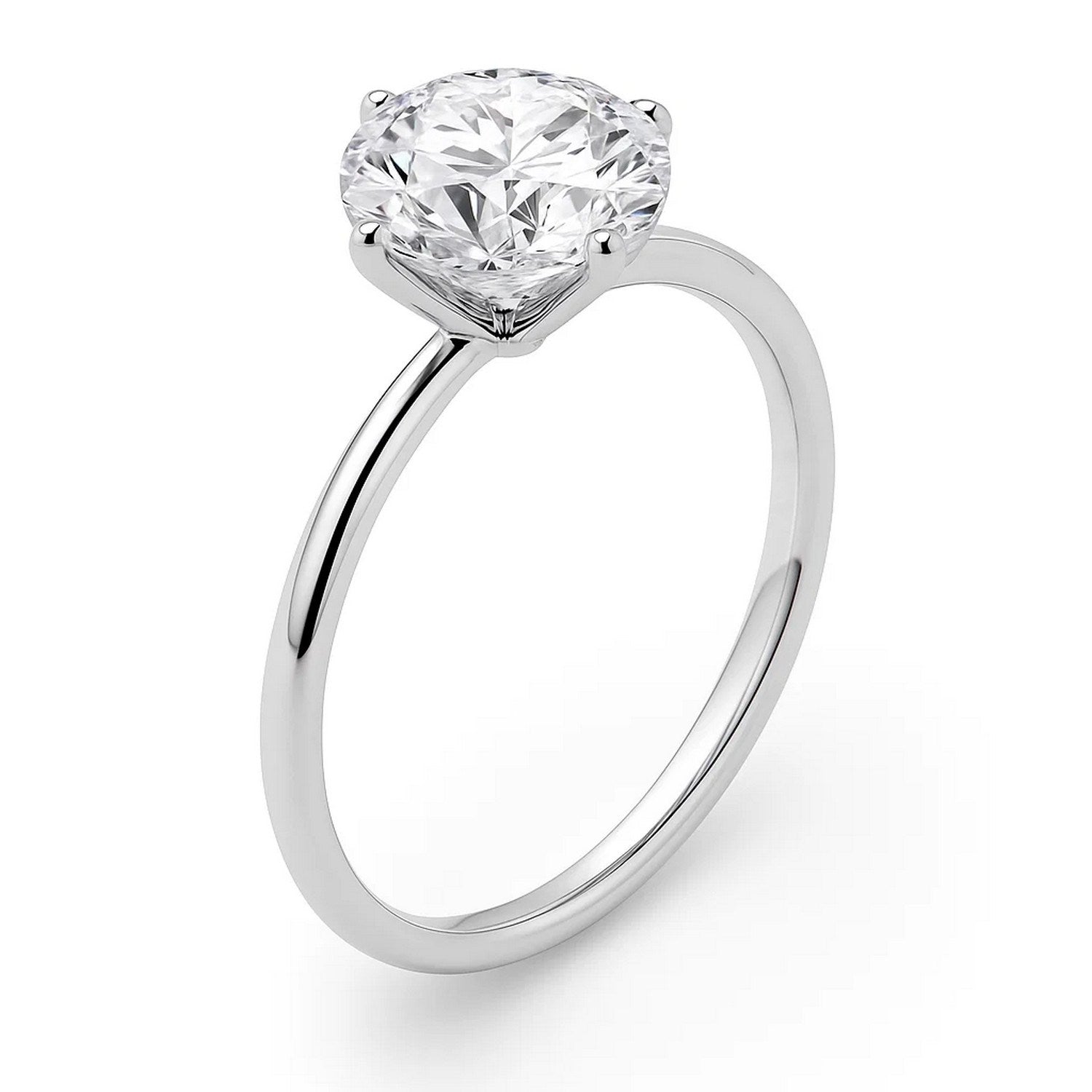 A 14K white gold solitaire ring with a round lab-grown diamond in a four-prong setting.