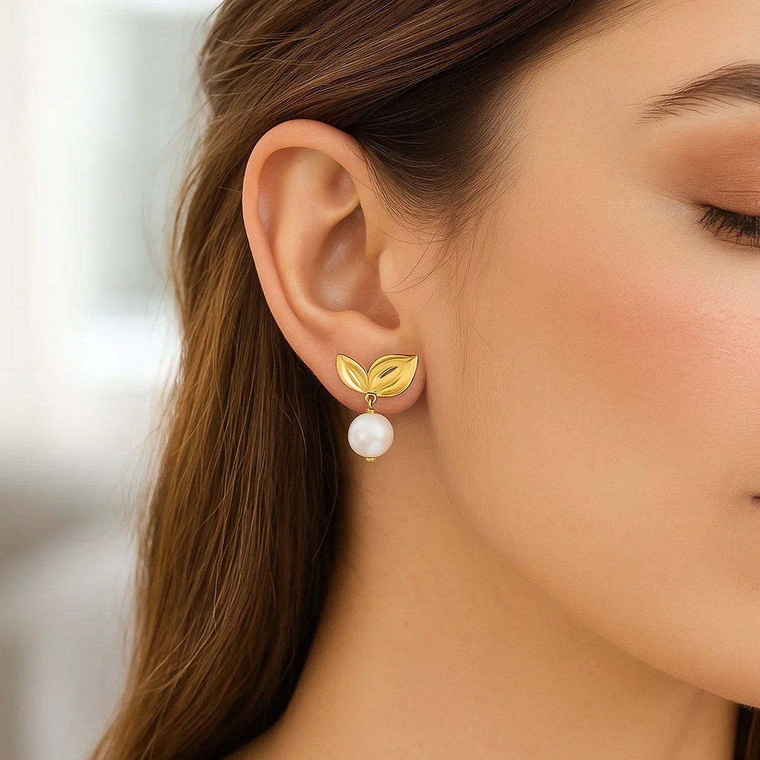 14K yellow gold cherry leaf earrings with a freshwater pearl drop.