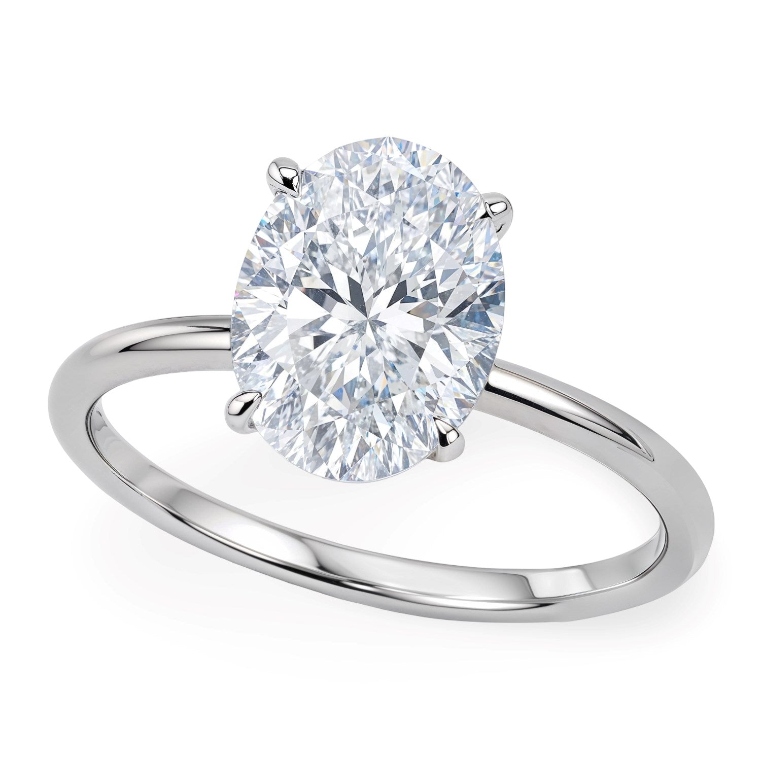 A 14K white gold solitaire ring with a large oval lab-grown diamond.