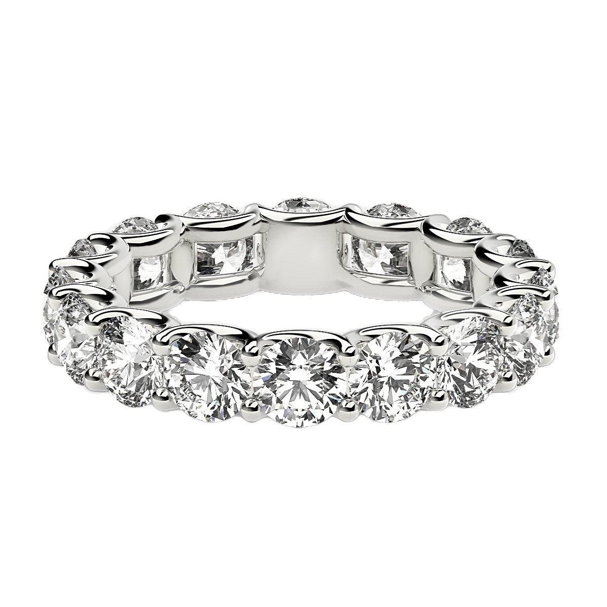 Round cut lab grown diamond eternity ring in 14k white gold.