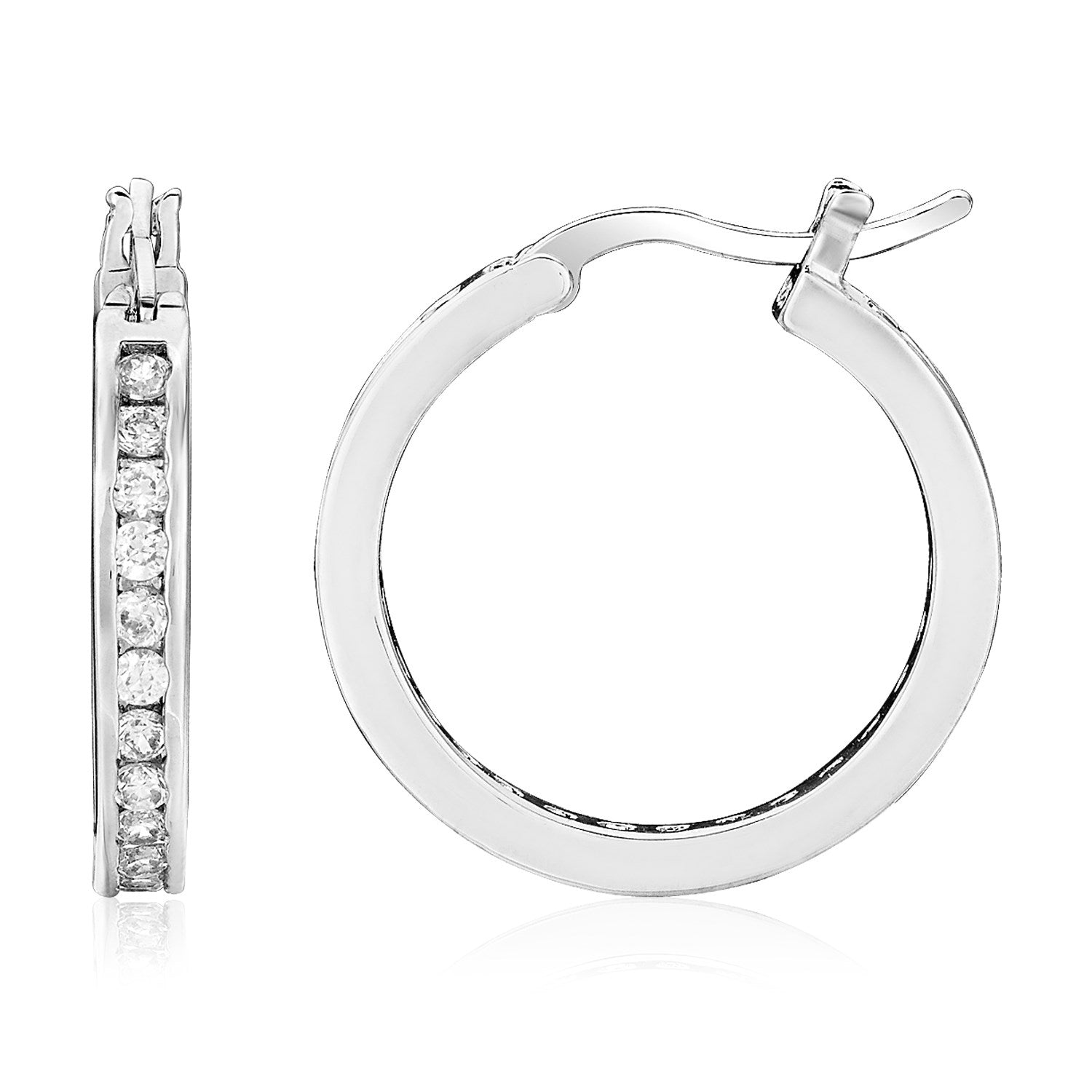 Sterling silver large hoop earrings with cubic zirconias and hinged clasps.