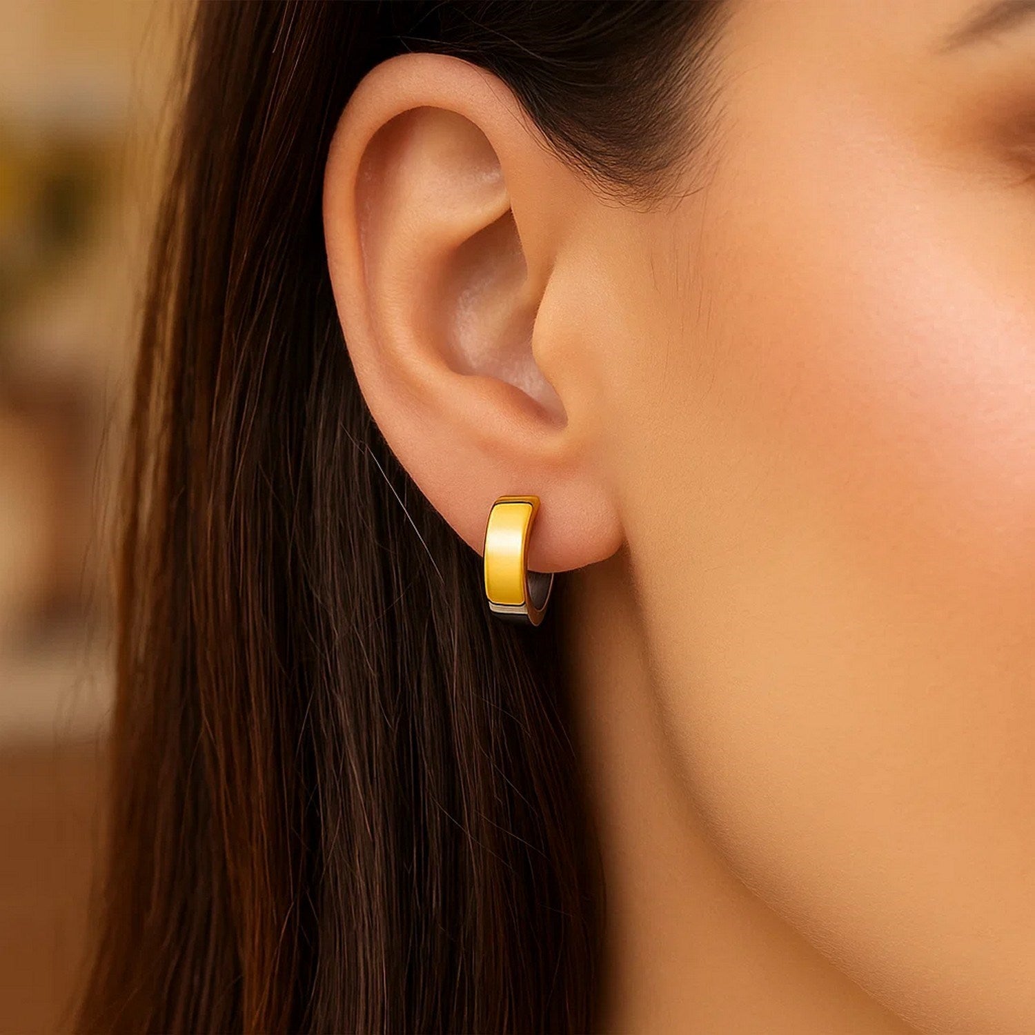 14k two-tone gold snuggable style hoop earrings with a hinged snap back.