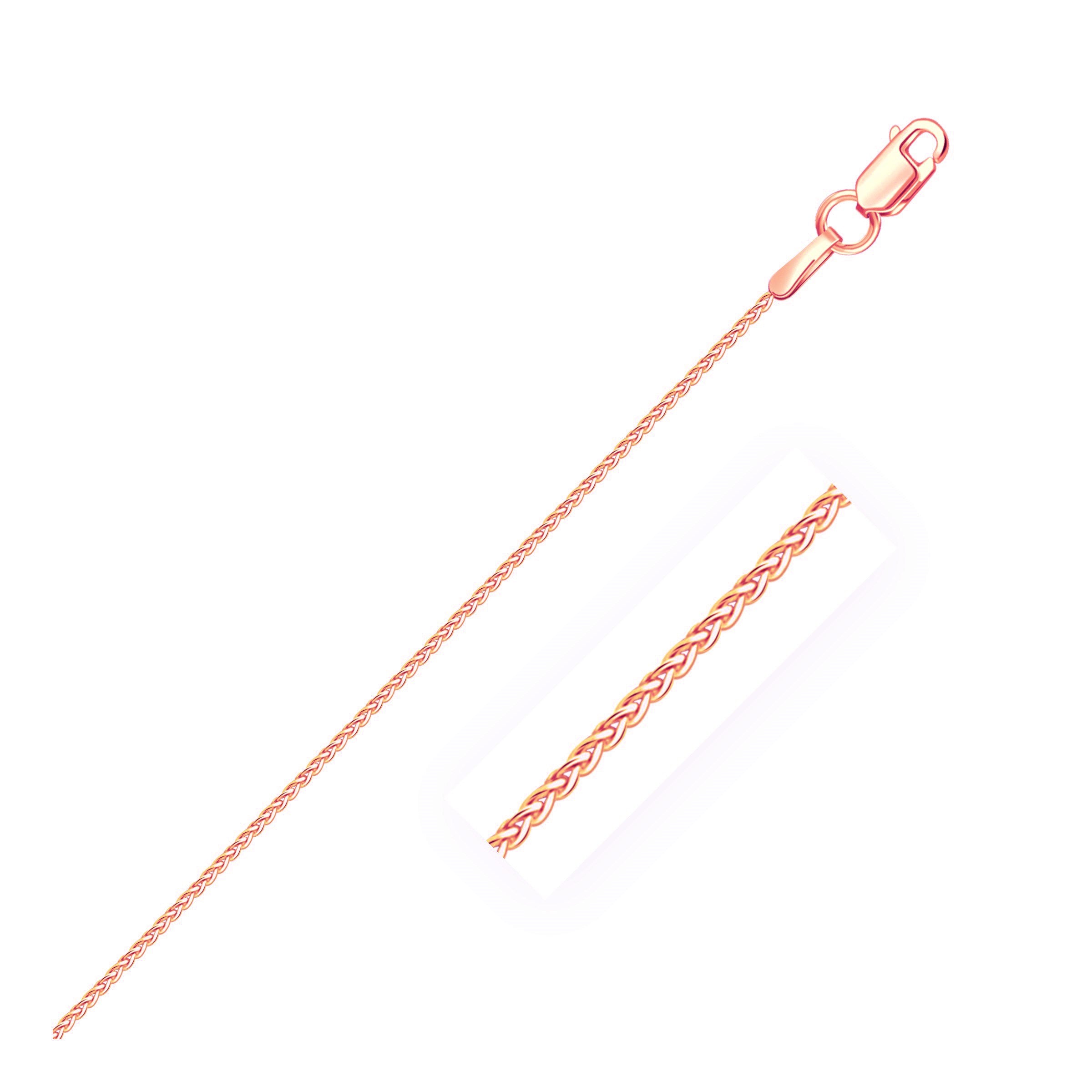 A 14k rose gold round wheat chain with a lobster clasp.