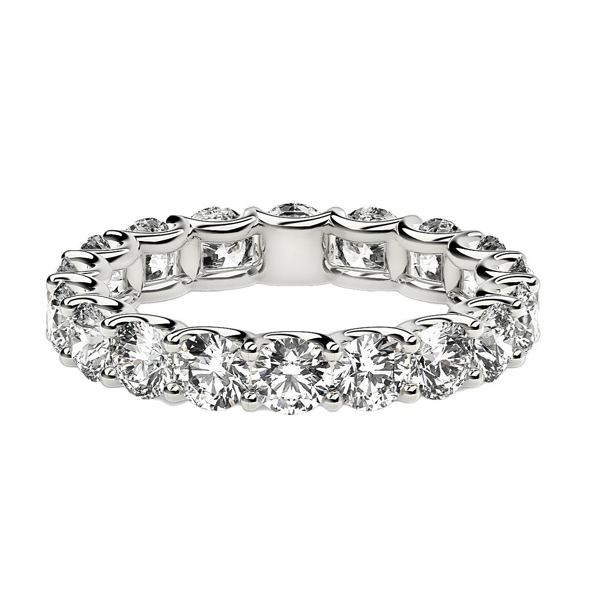 Round cut lab grown diamond eternity ring in 14k white gold.