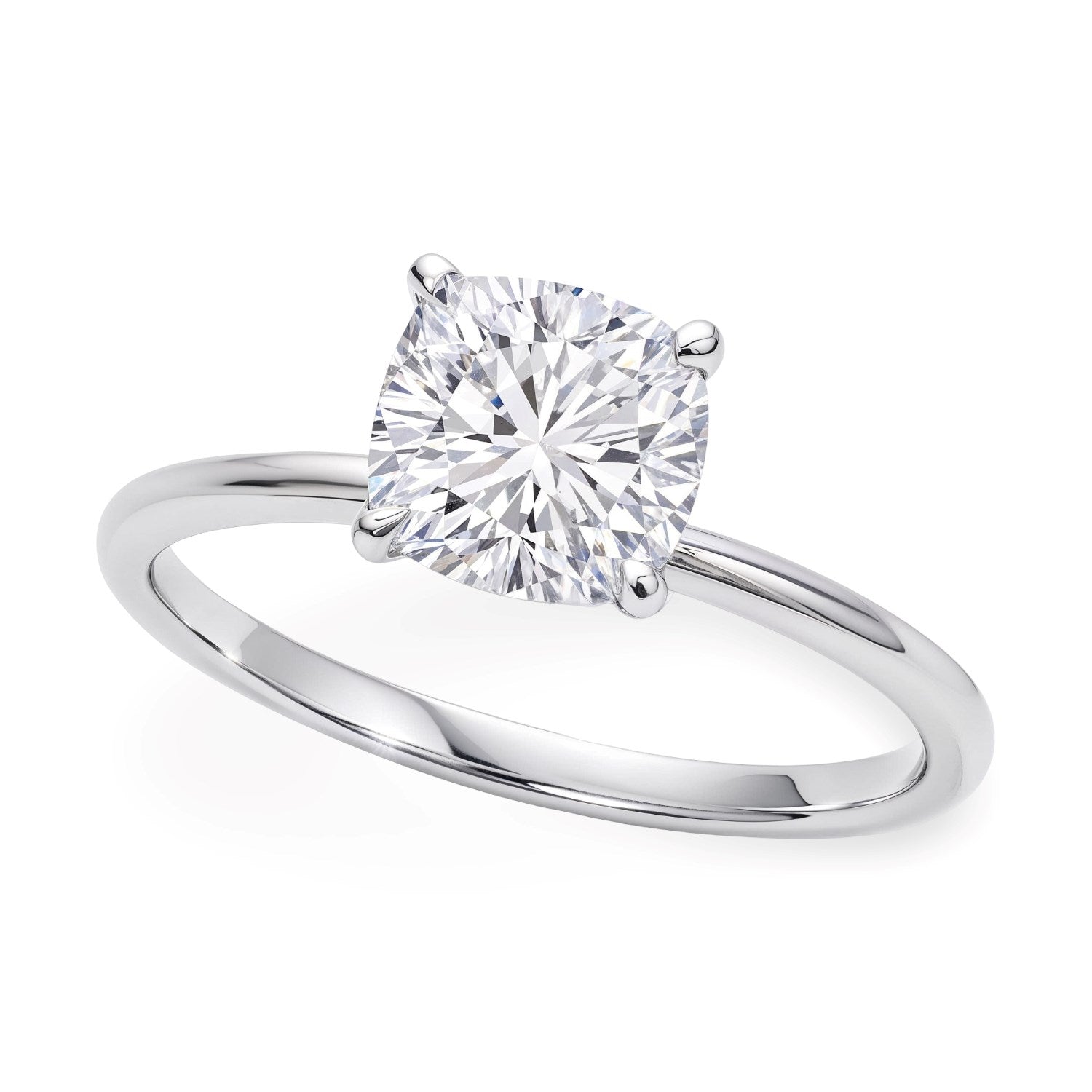 A 14K white gold solitaire ring with a cushion-cut lab-grown diamond.