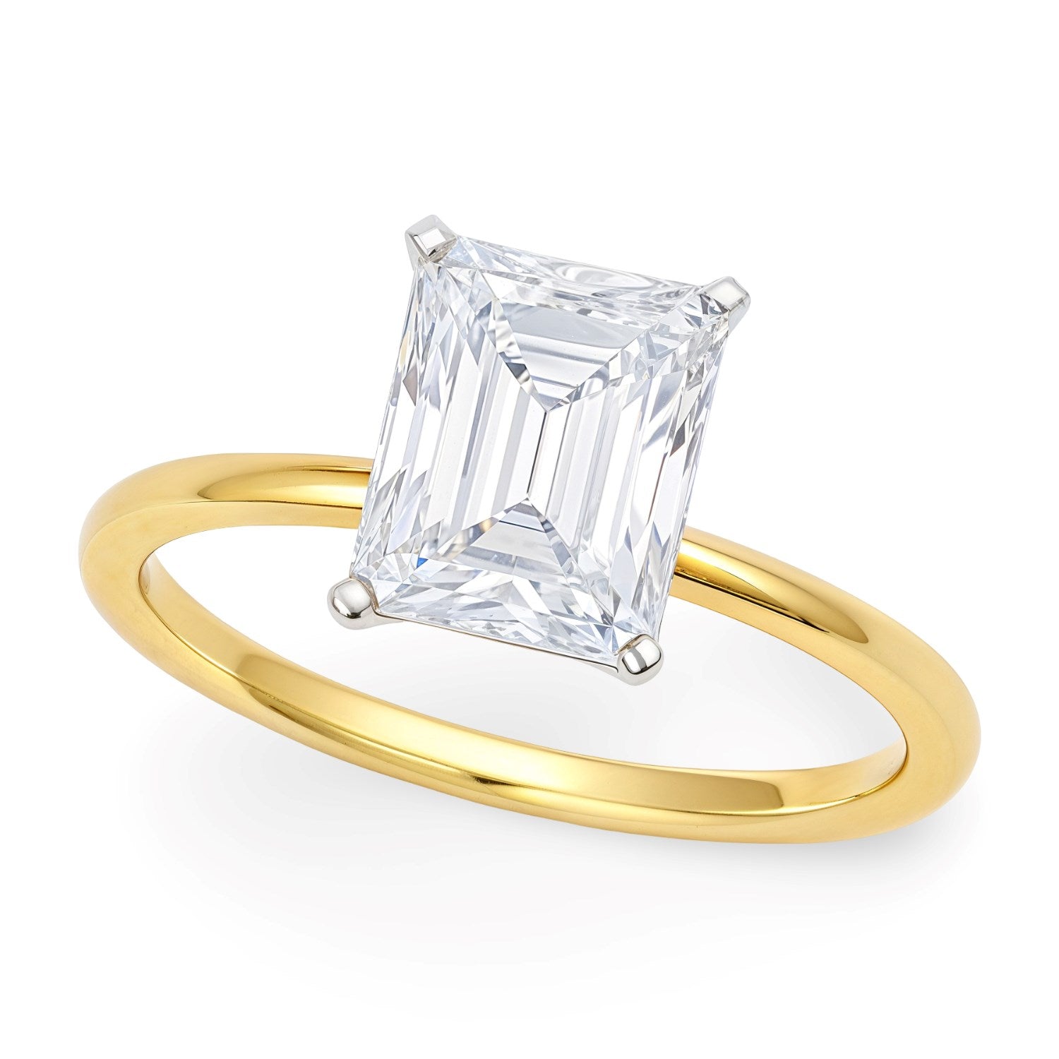 Radiant lab-grown diamond solitaire ring with a yellow gold band and white gold prongs.