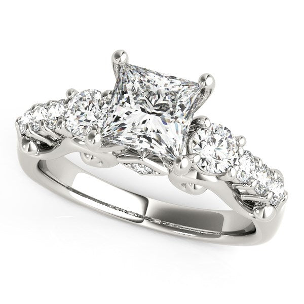14k white gold engagement ring with a princess-cut center diamond and round side stones.