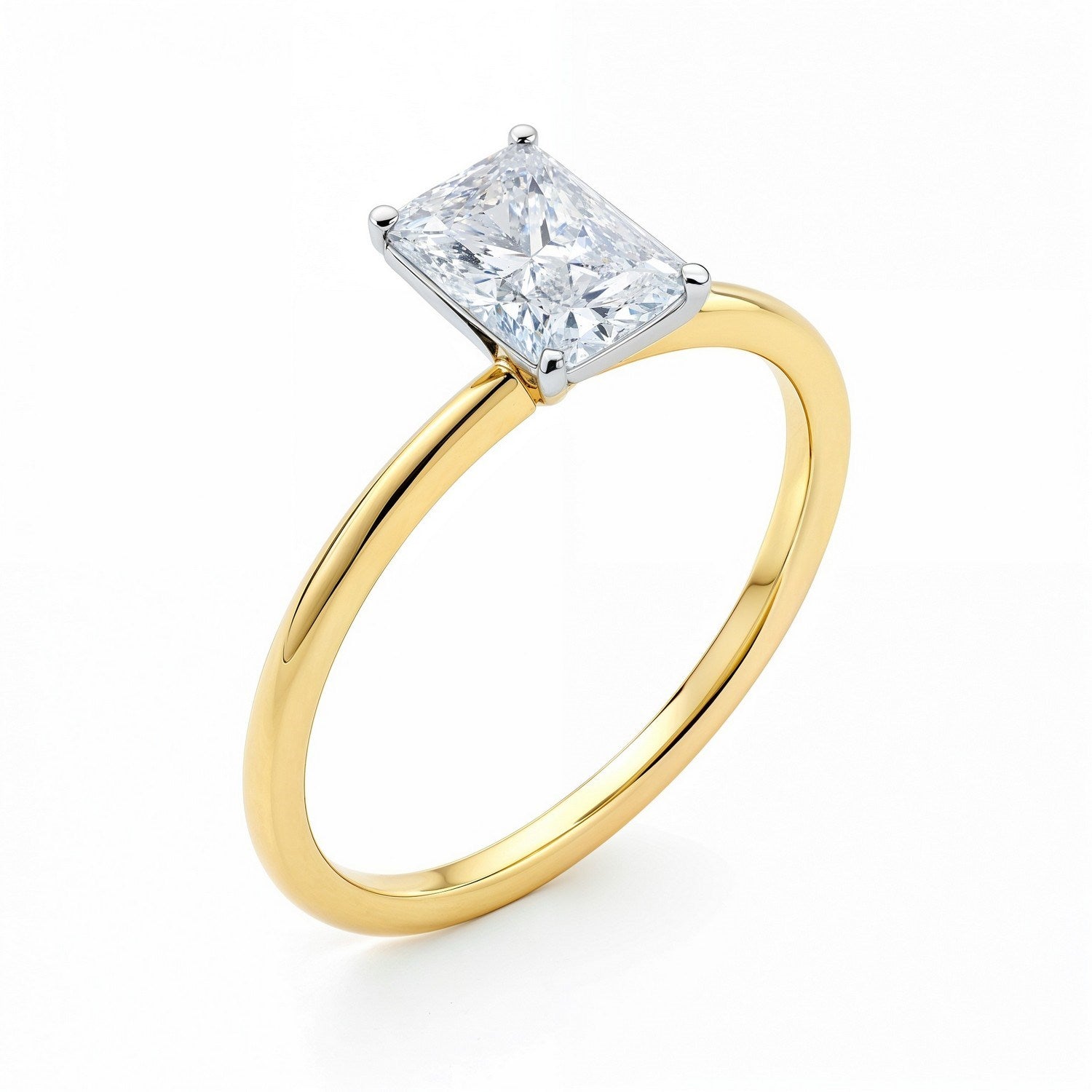 Radiant lab-grown diamond solitaire ring with a yellow gold band and white gold prongs.