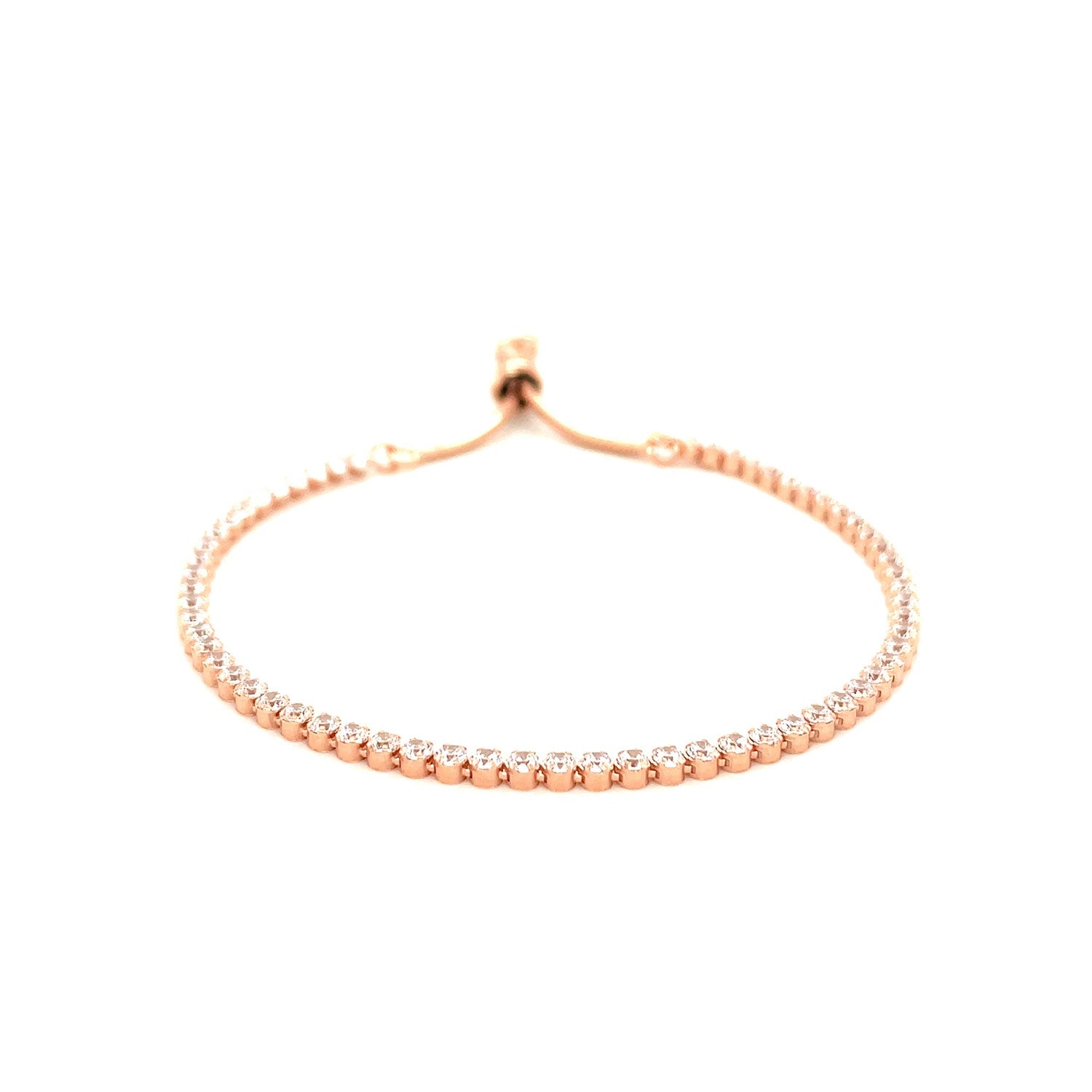 Adjustable tennis-style bracelet with cubic zirconia in rose-toned sterling silver.