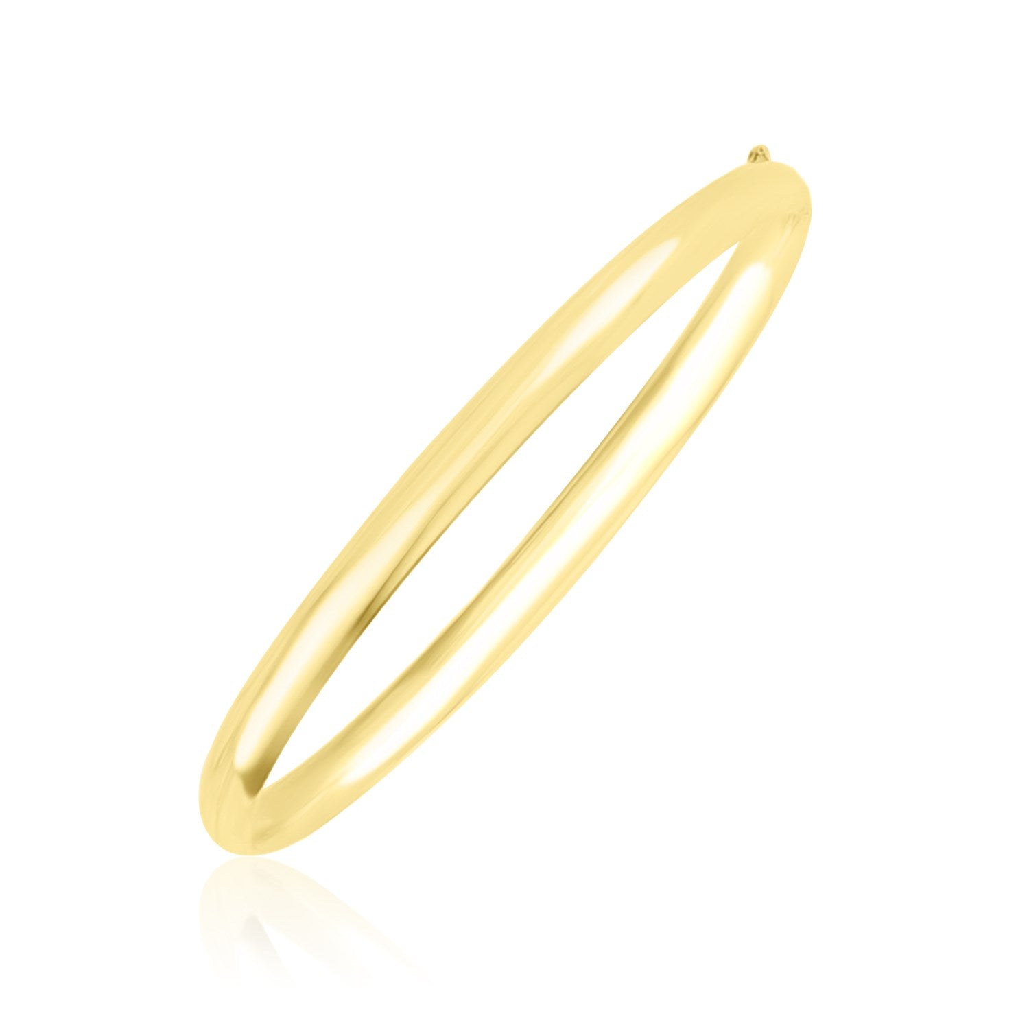 10k yellow gold dome style shiny bangle with a polished finish.