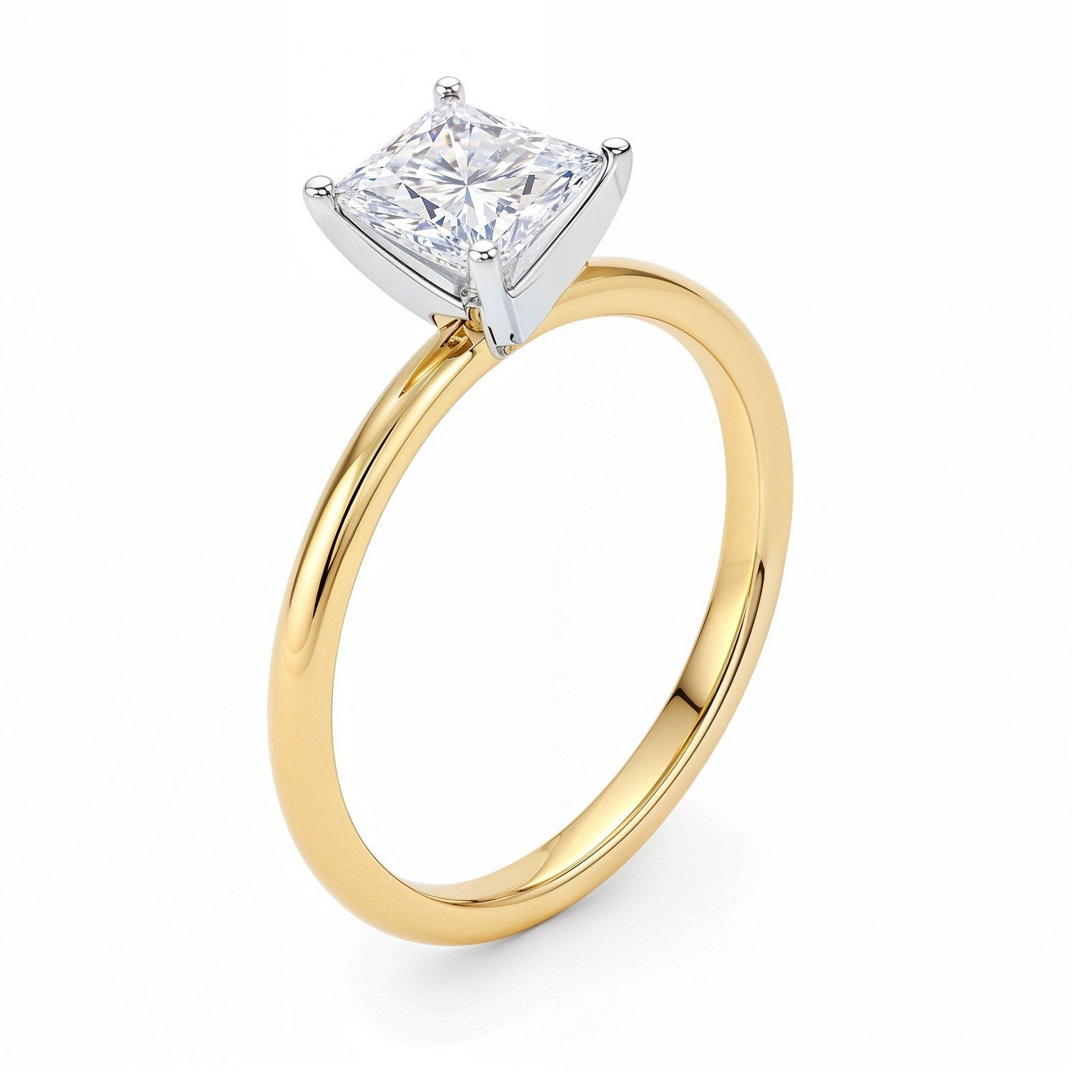 A princess-cut lab-grown diamond solitaire ring with a yellow gold band.