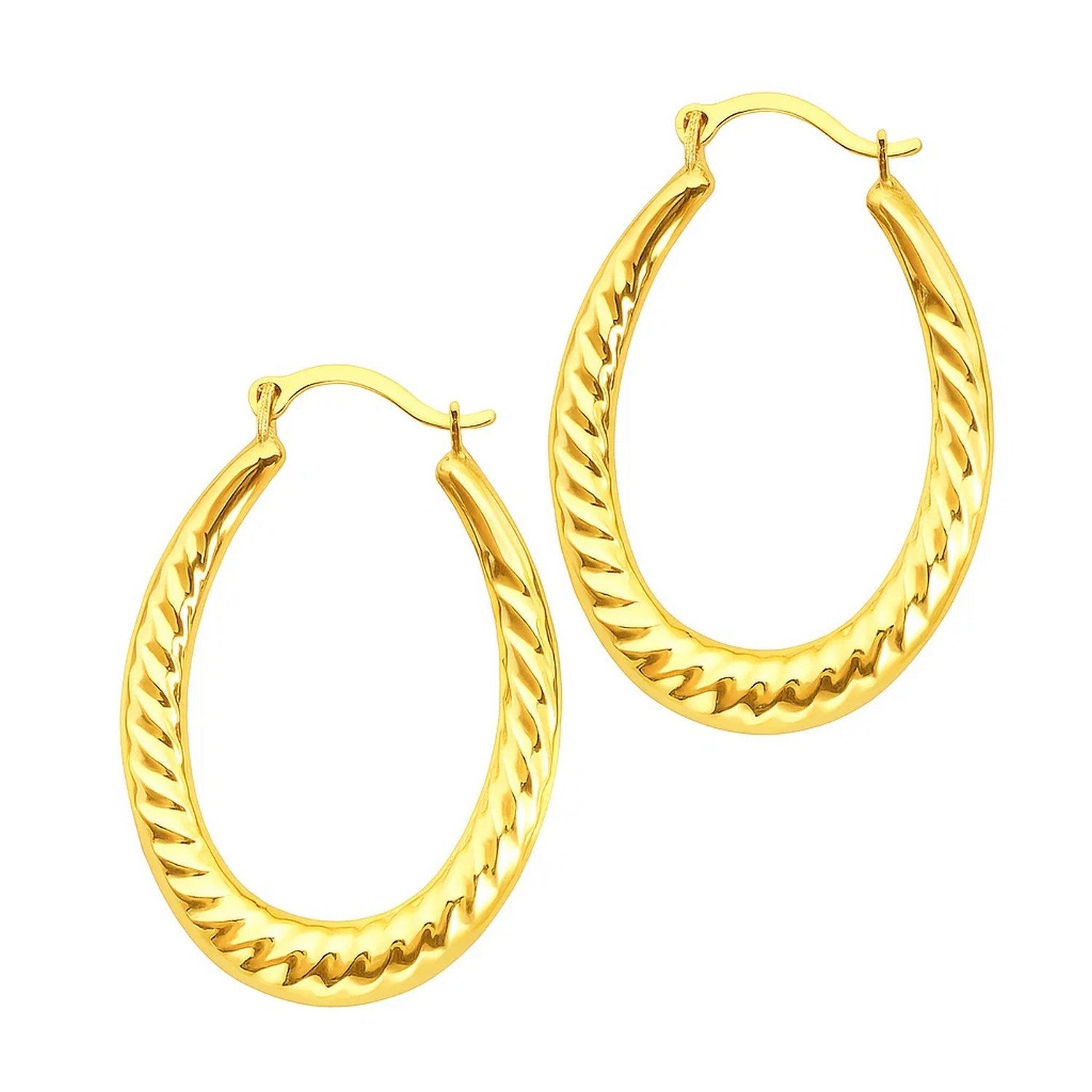Pair of 14k yellow gold oval hoop earrings with textured details.