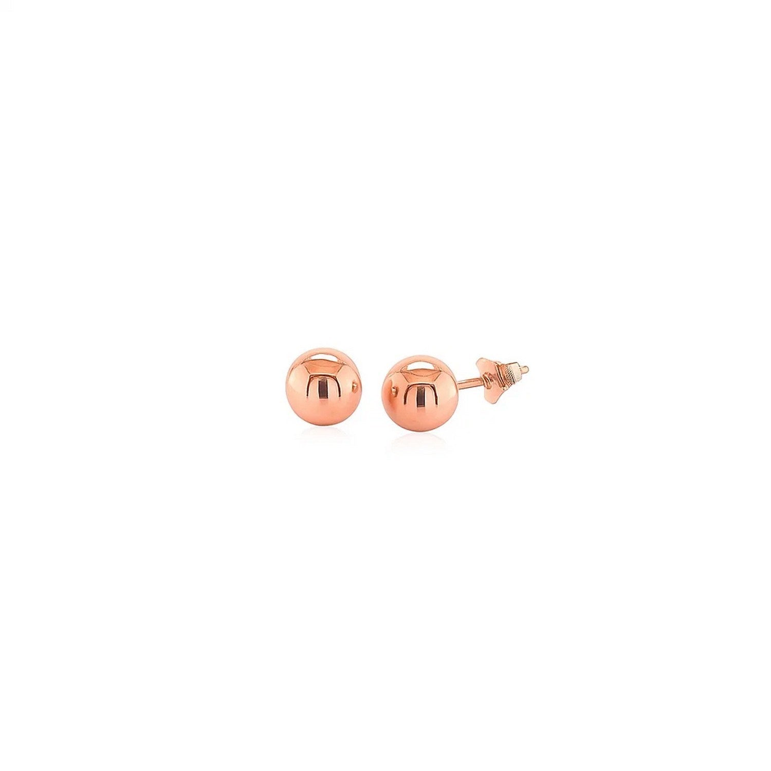 A pair of 14k rose gold classic round stud earrings with a shiny finish.