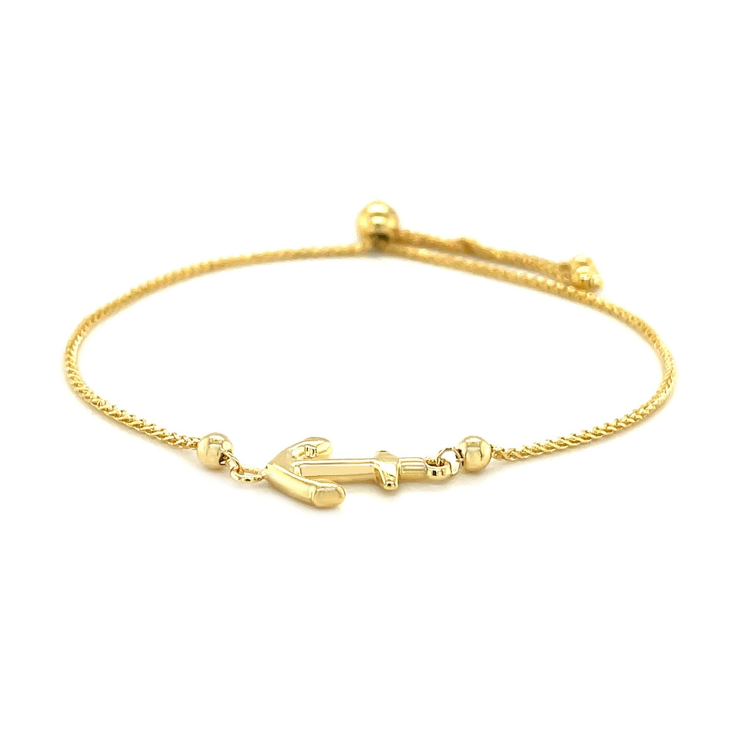 14k yellow gold adjustable lariat bracelet with an anchor design.